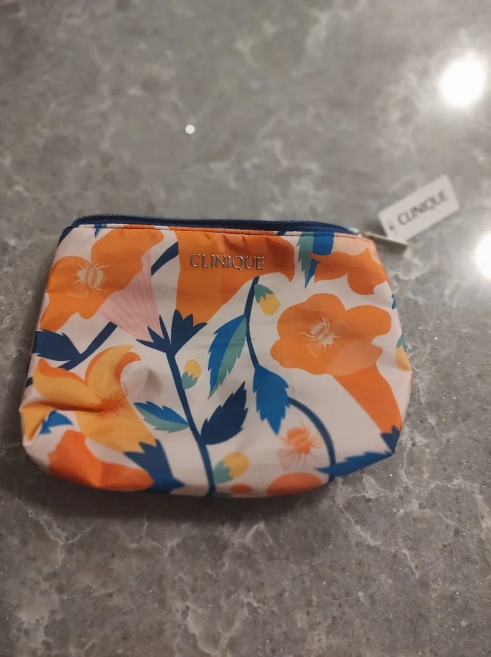 Clinique New with tags cosmetic bag pretty orange/blue